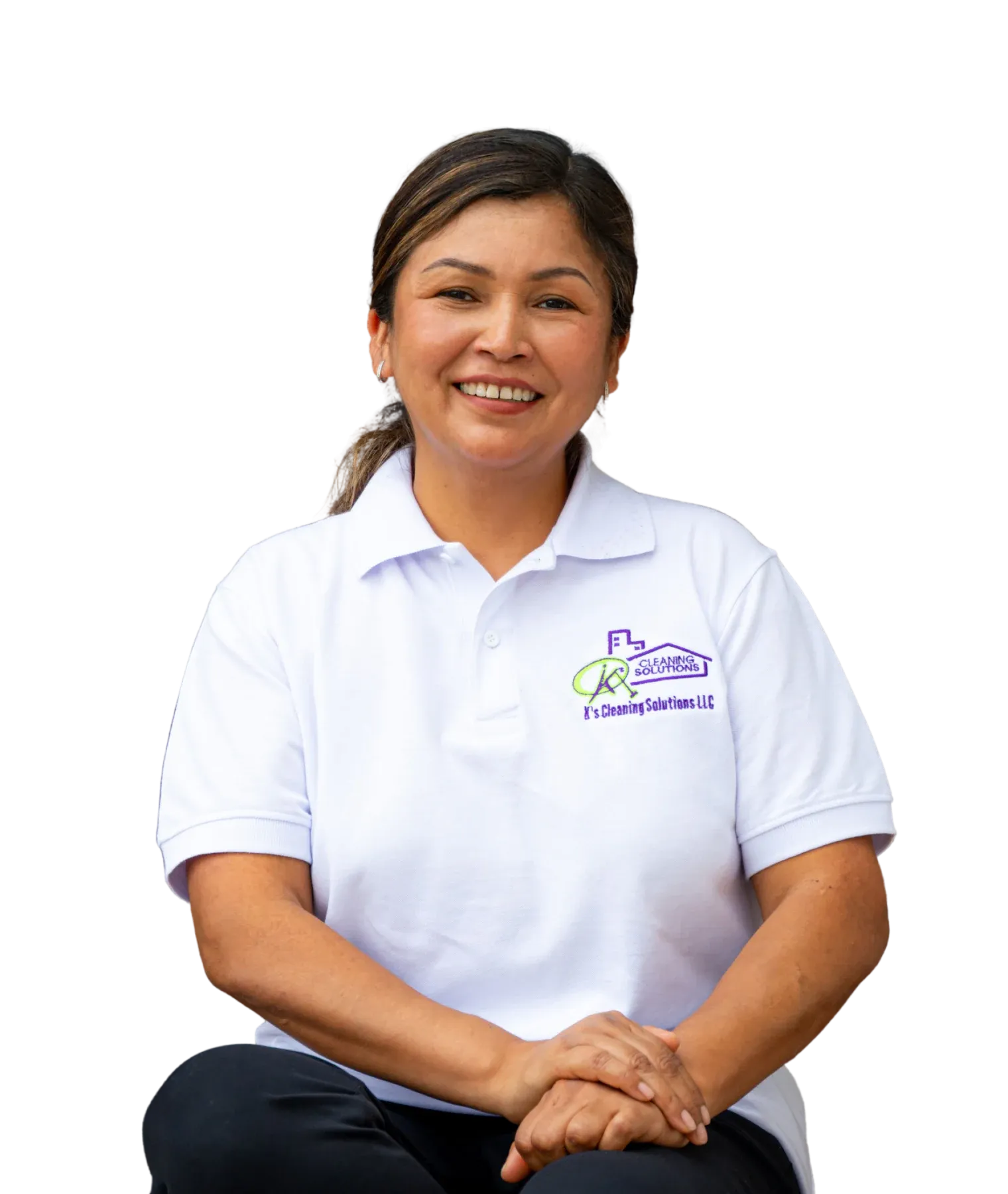 K's Cleaning Solutions team member holding cleaning supplies